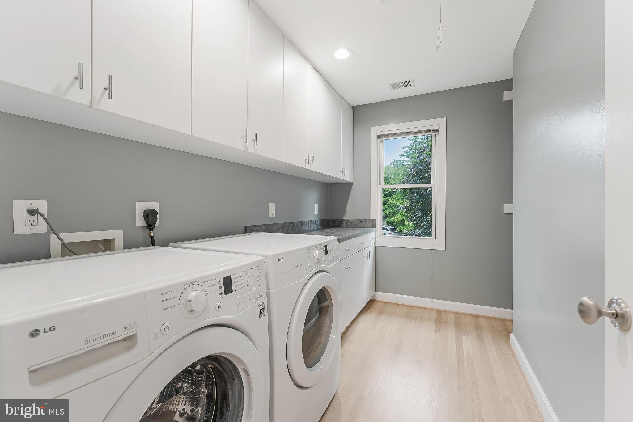 1655 Hunting Ridge Court McLean, VA 22101 - Photo 27 of 38 a utility room with dryer and washer