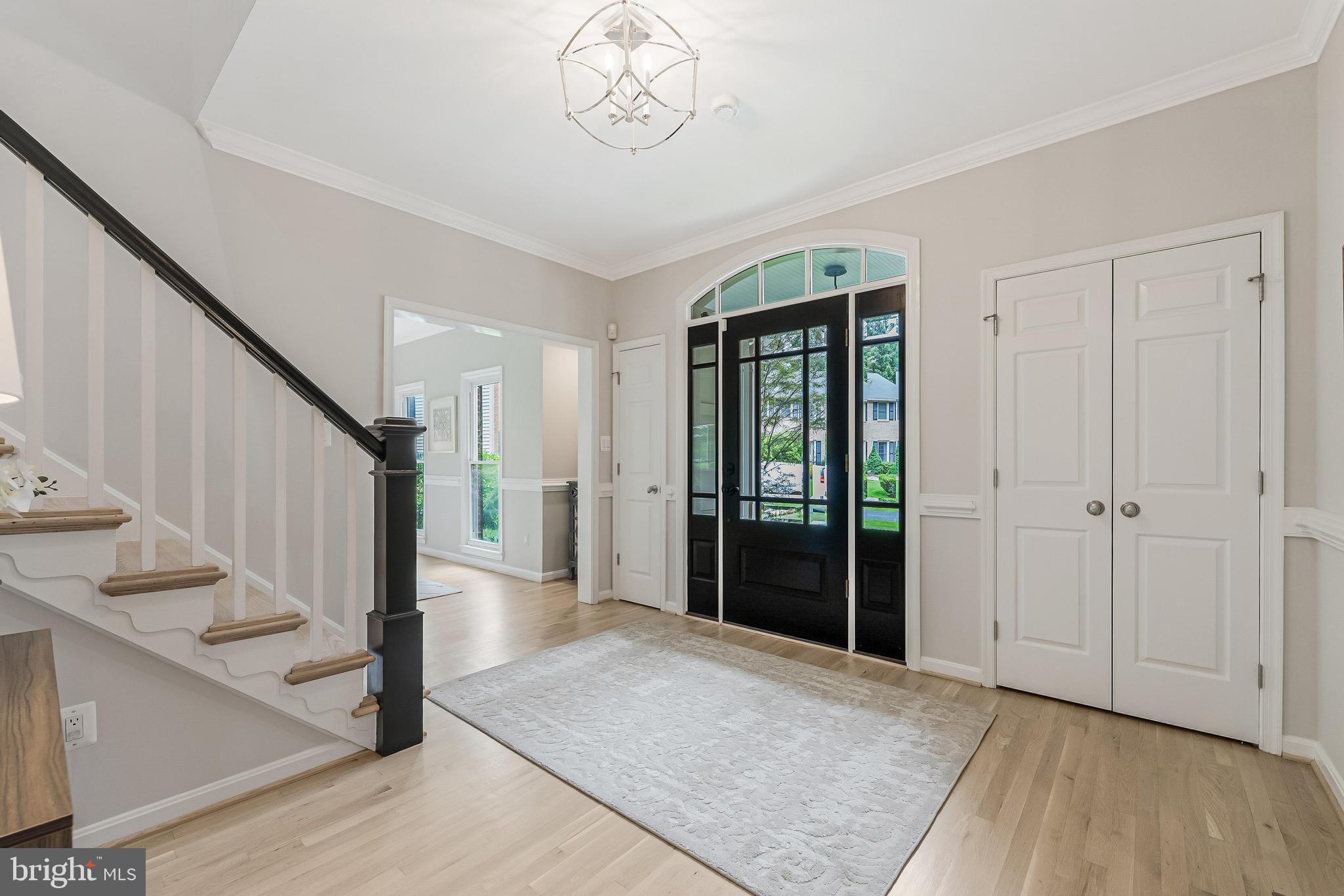 1655 Hunting Ridge Court McLean, VA 22101 - Photo 4 of 38 a view of an entryway with wooden floor and stairs