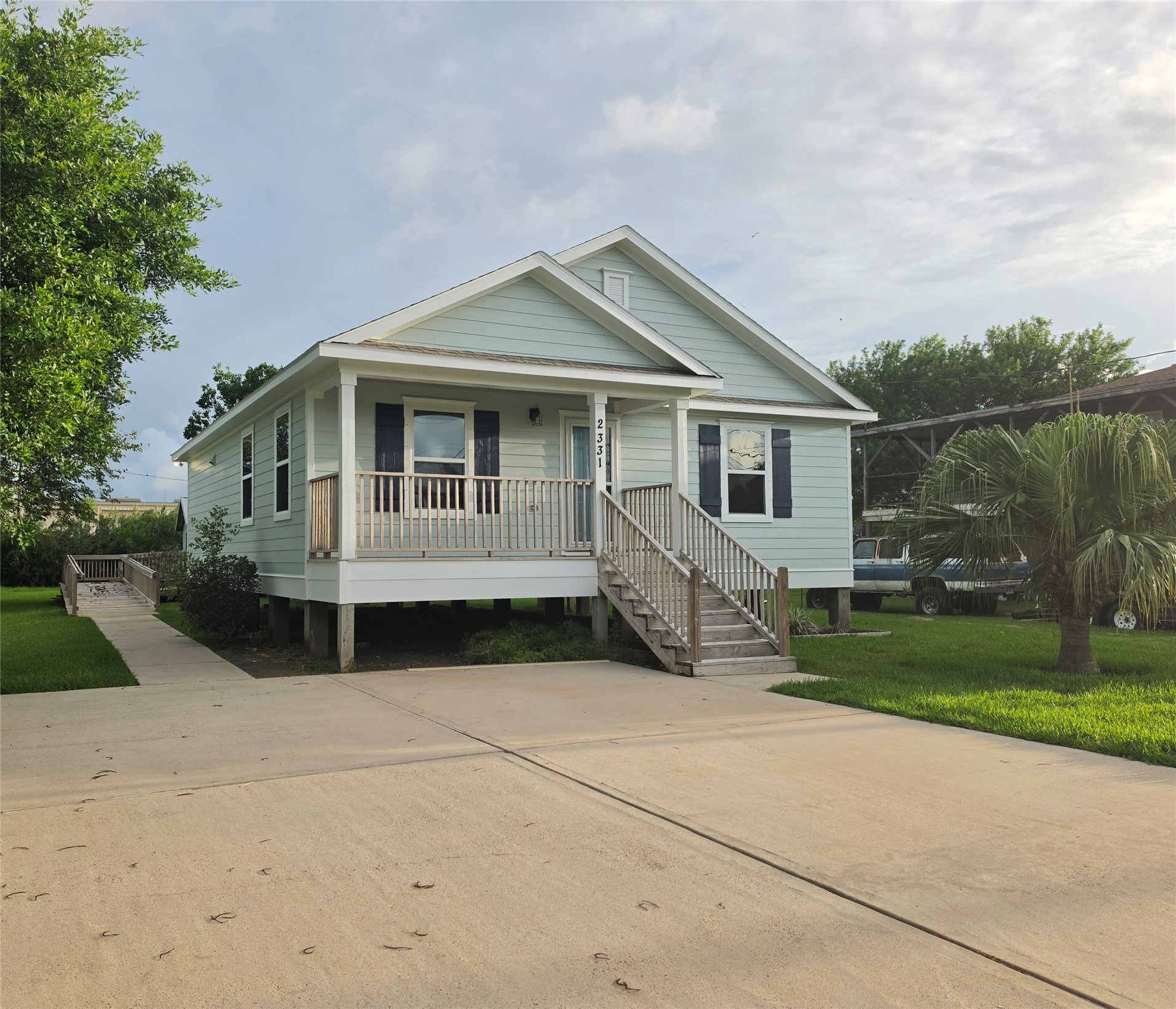 2331 Rue De Lafitte Street San Leon, TX 77539 - Photo 2 of 14 Extra large driveway for boat parking.