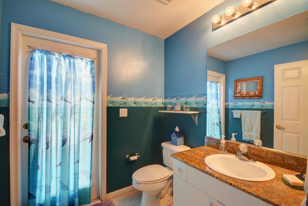 2414 Southeast Springtree Place Stuart, FL 34997 - Photo 28 of 28 Springtree cabana bathroom