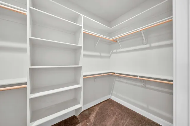 a view of an empty walk in closet