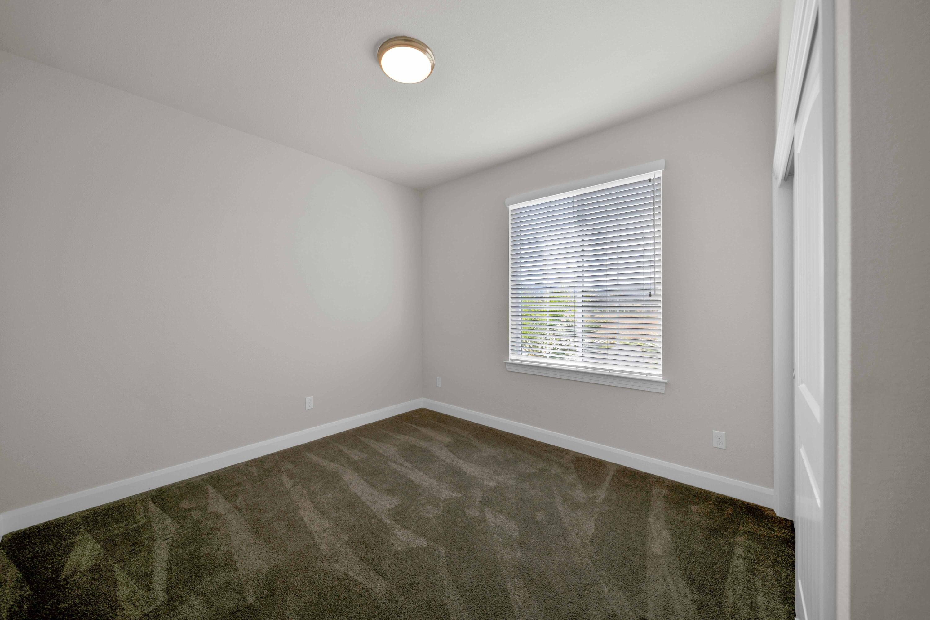 4771 Lower Springs Road Redding, CA 96001 - Photo 19 of 30 an empty room with a window