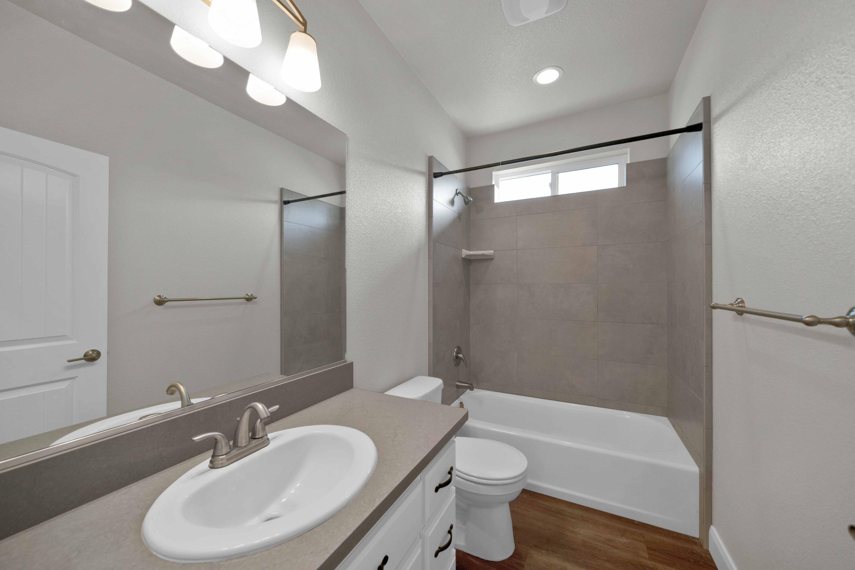 4771 Lower Springs Road Redding, CA 96001 - Photo 20 of 30 a bathroom with a sink toilet bathtub and vanity