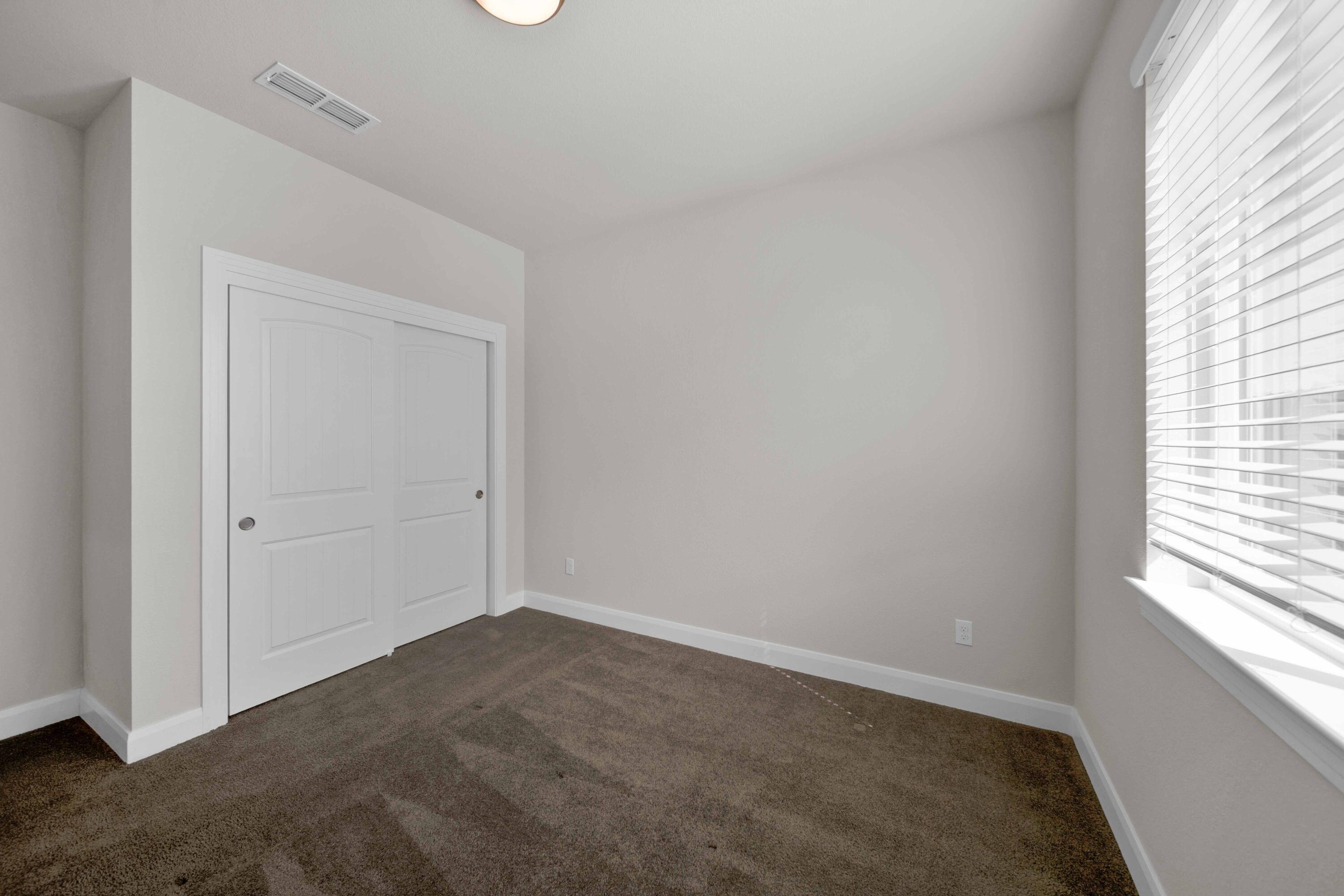 4771 Lower Springs Road Redding, CA 96001 - Photo 21 of 30 a view of an empty room and window