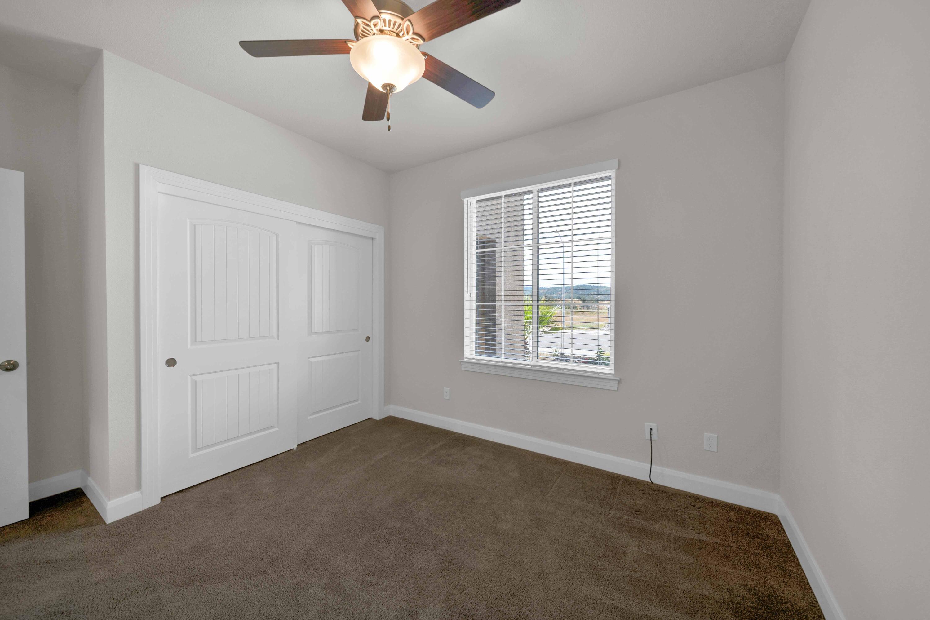 4771 Lower Springs Road Redding, CA 96001 - Photo 22 of 30 a view of an empty room with a window