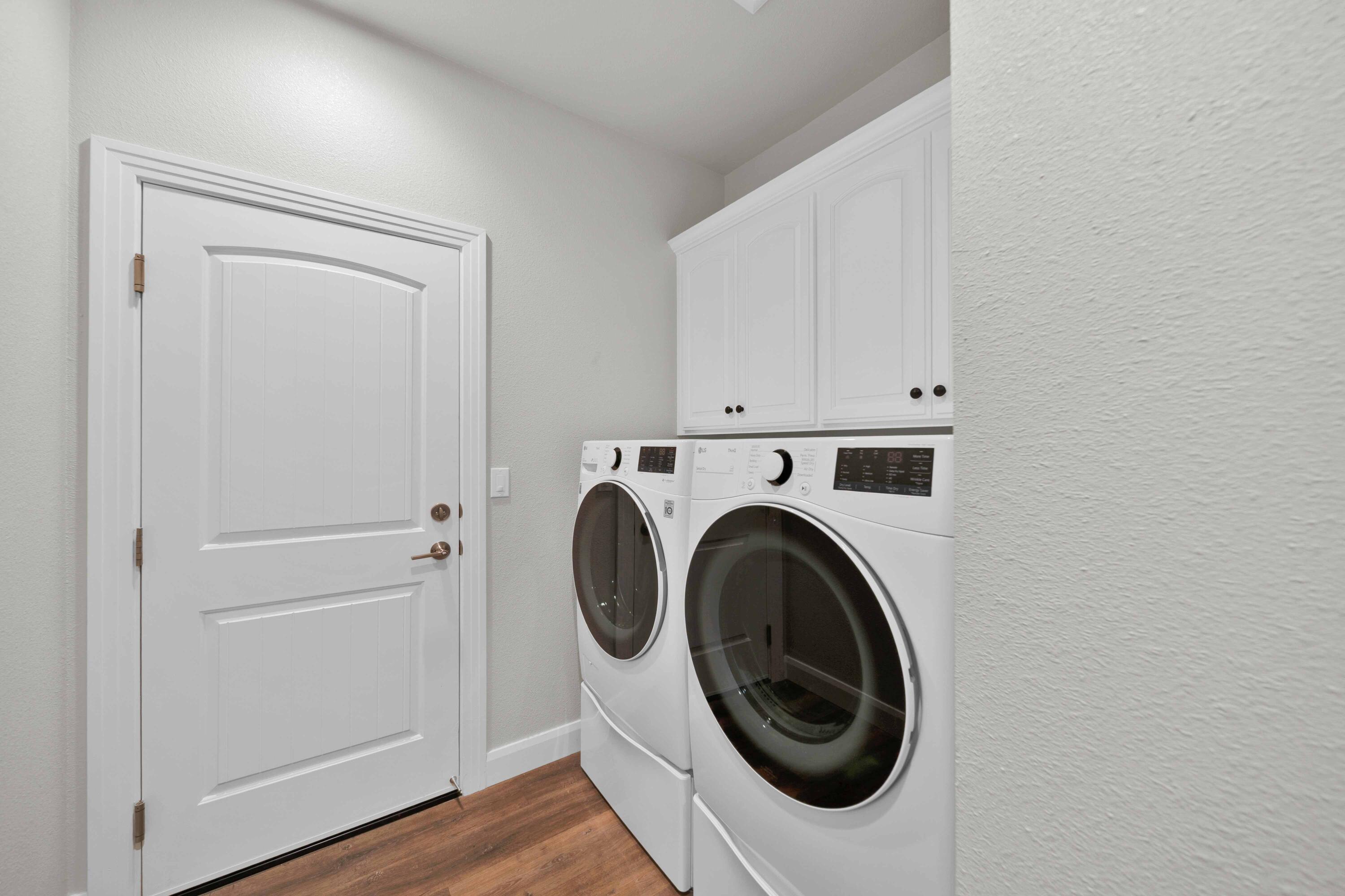 4771 Lower Springs Road Redding, CA 96001 - Photo 23 of 30 a utility room with dryer and washer