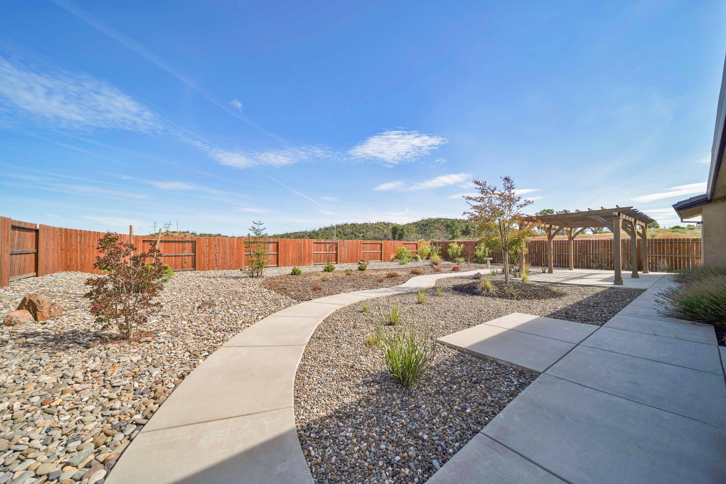 4771 Lower Springs Road Redding, CA 96001 - Photo 27 of 30 a view of a swimming pool with a lounge chairs