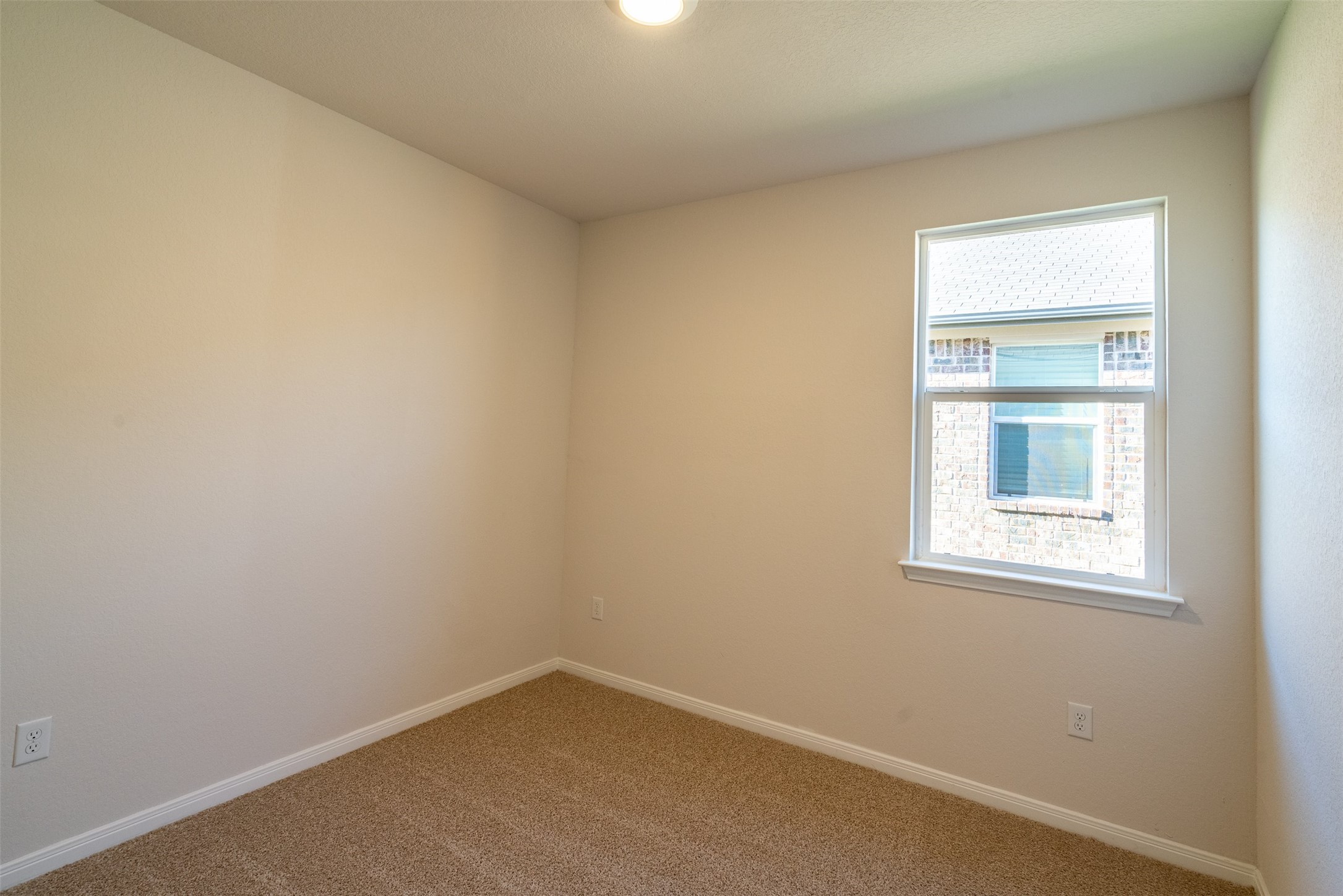 233 Brooklyn Drive Georgetown, TX 78626 - Photo 16 of 21 an empty room with a window
