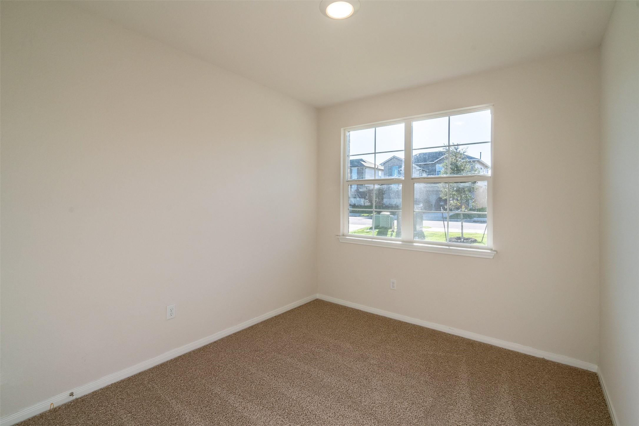 233 Brooklyn Drive Georgetown, TX 78626 - Photo 18 of 21 an empty room with a window