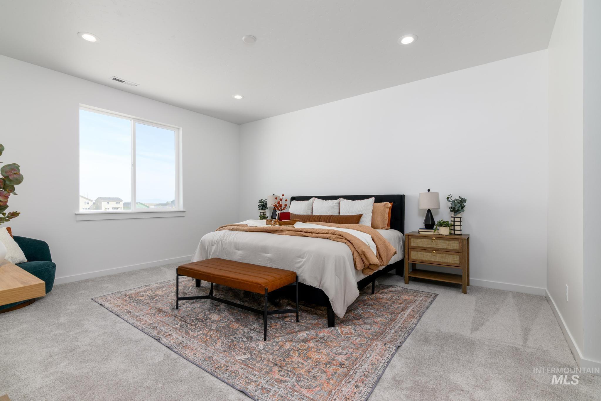 6049 West Snow Currant Street Meridian, ID 83646 - Photo 7 of 12 Bedroom featuring recessed lighting and light carpet