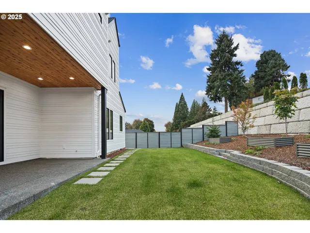 a view of a backyard with a garden