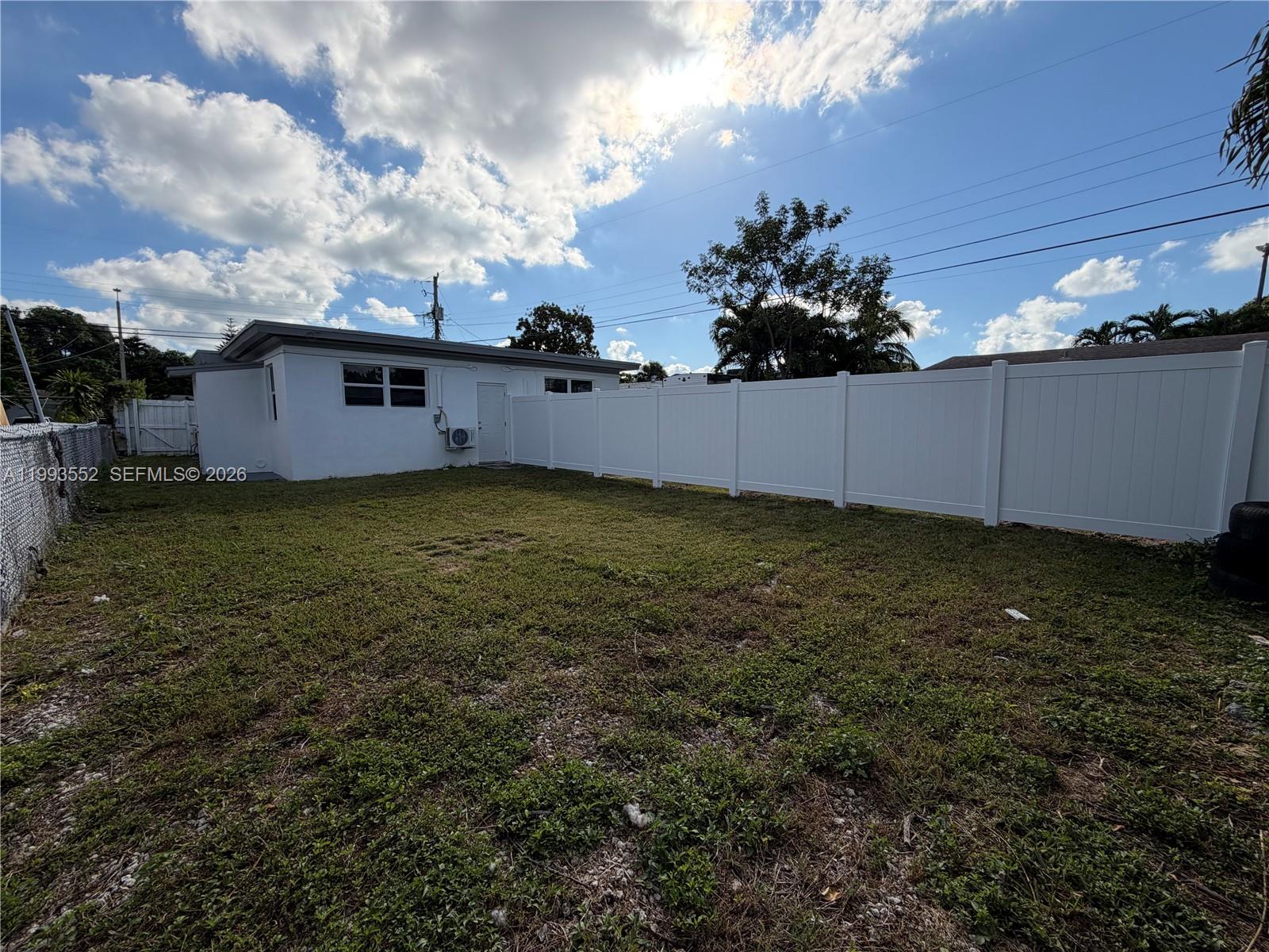 2784 Southwest 31st Place Miami, FL 33133 - Photo 15 of 16 a view of a house with a yard