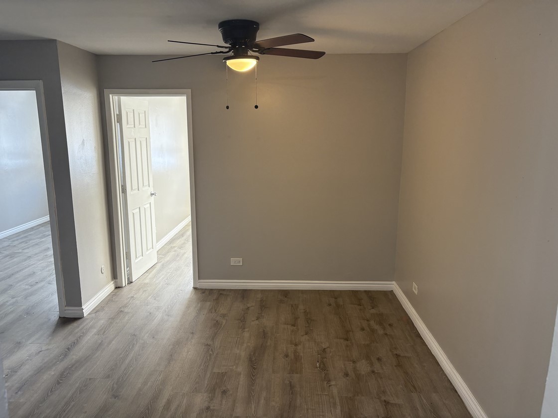 1930 South Cicero Avenue, Unit 208 Cicero, IL 60804 - Photo 5 of 9 wooden floor in an empty room