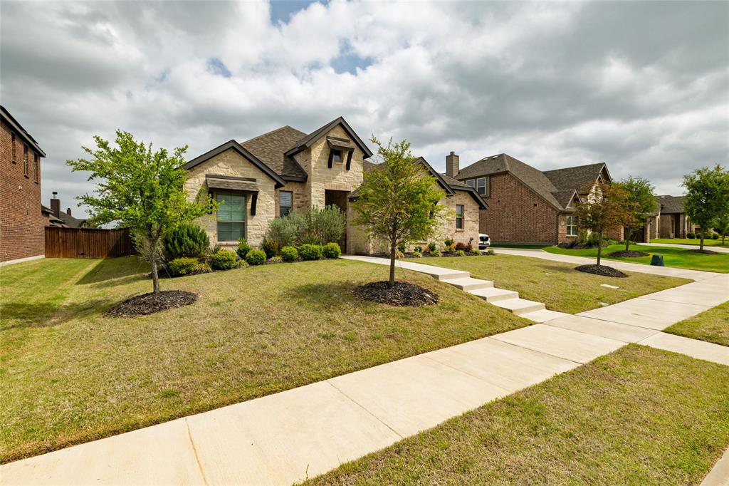 4045 Grove Valley Road Midlothian, TX 76065 - Photo 2 of 34 View of front of property with stone siding and a residential view
