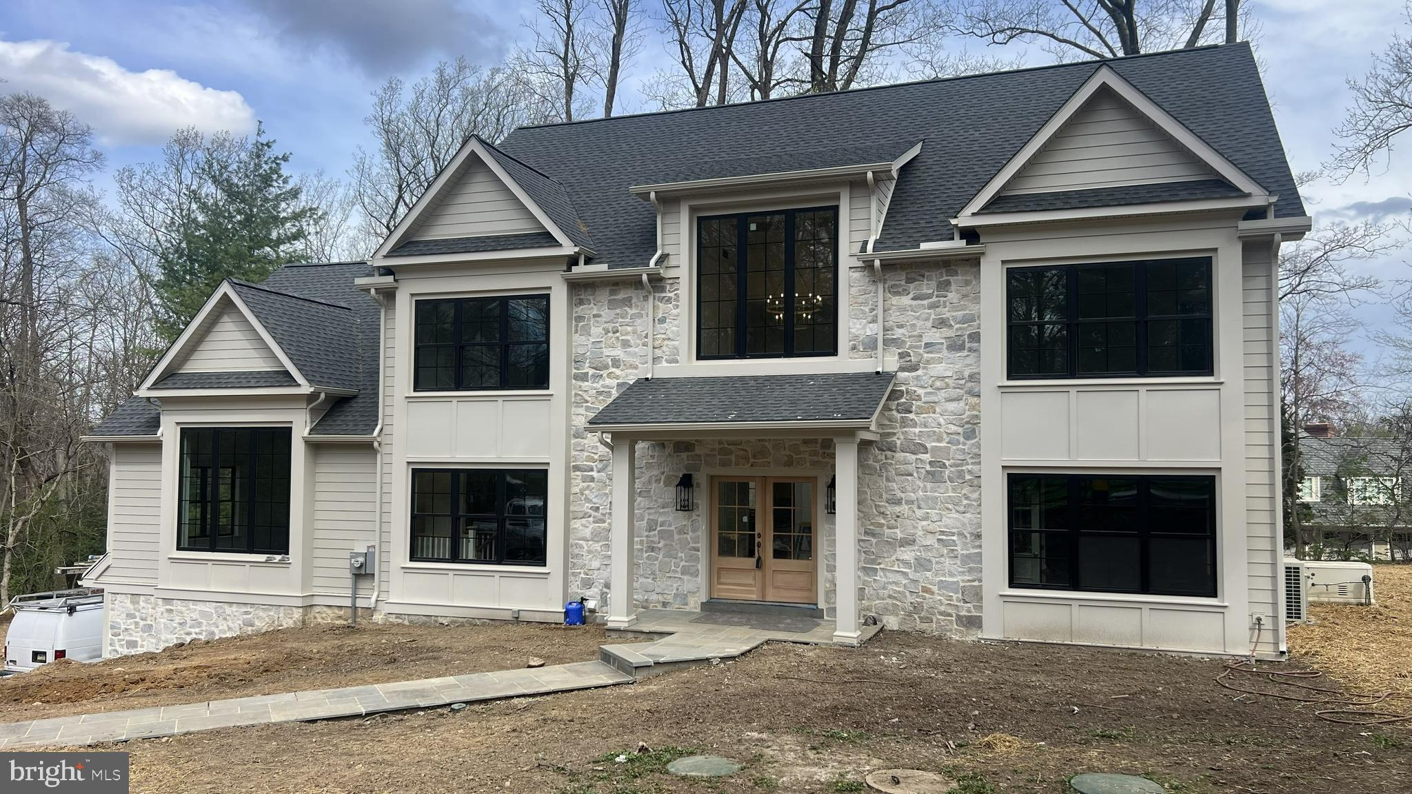 a front view of a house with yard