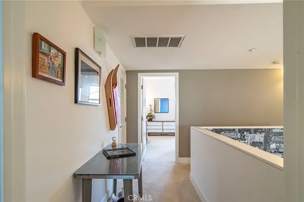 a view of livingroom with furniture and workspace