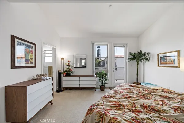 a bedroom with furniture and a bed
