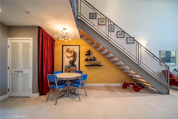 a view of a balcony with furniture and a table