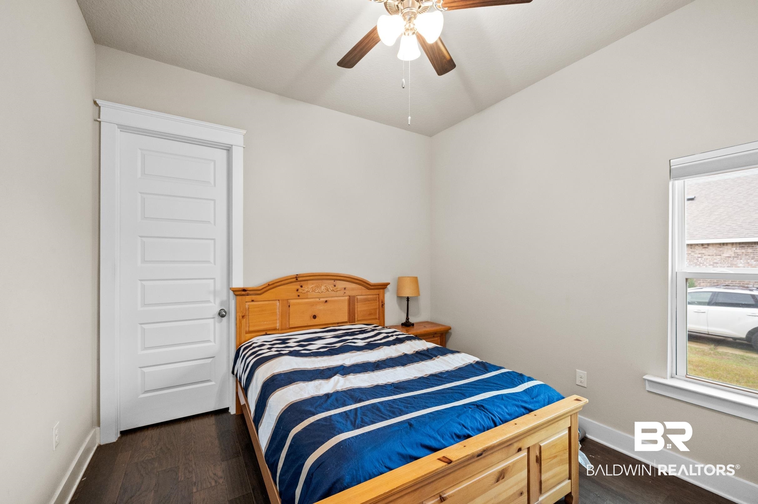31355 Limpkin Street Daphne, AL 36527 - Photo 43 of 57 Bedroom with ceiling fan and dark hardwood / wood-style floors