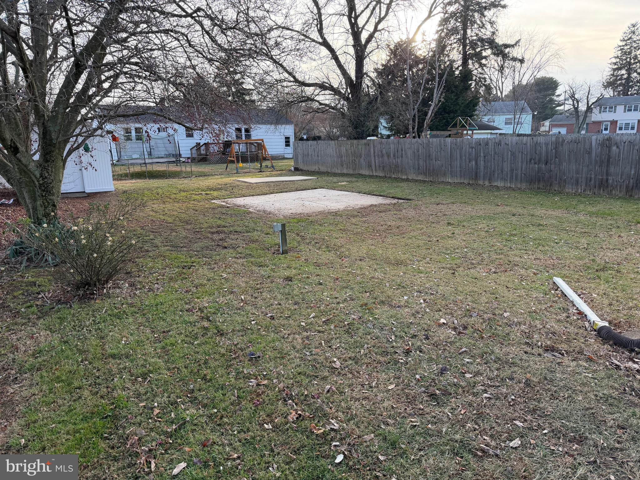 972 South Little Creek Road Dover, DE 19901 - Photo 20 of 22 a front view of a house with a yard and trees