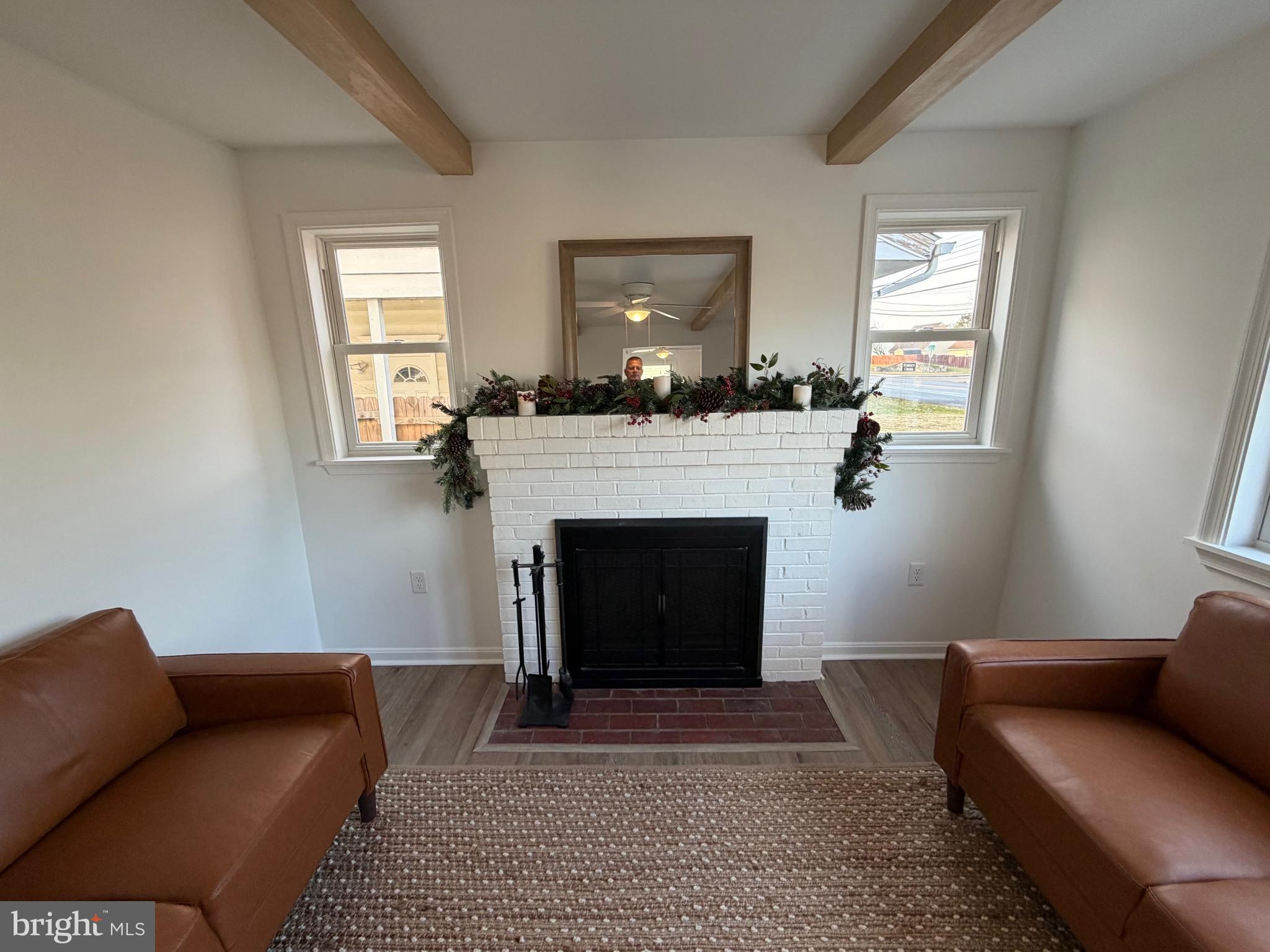 972 South Little Creek Road Dover, DE 19901 - Photo 4 of 22 a living room with furniture and a fireplace