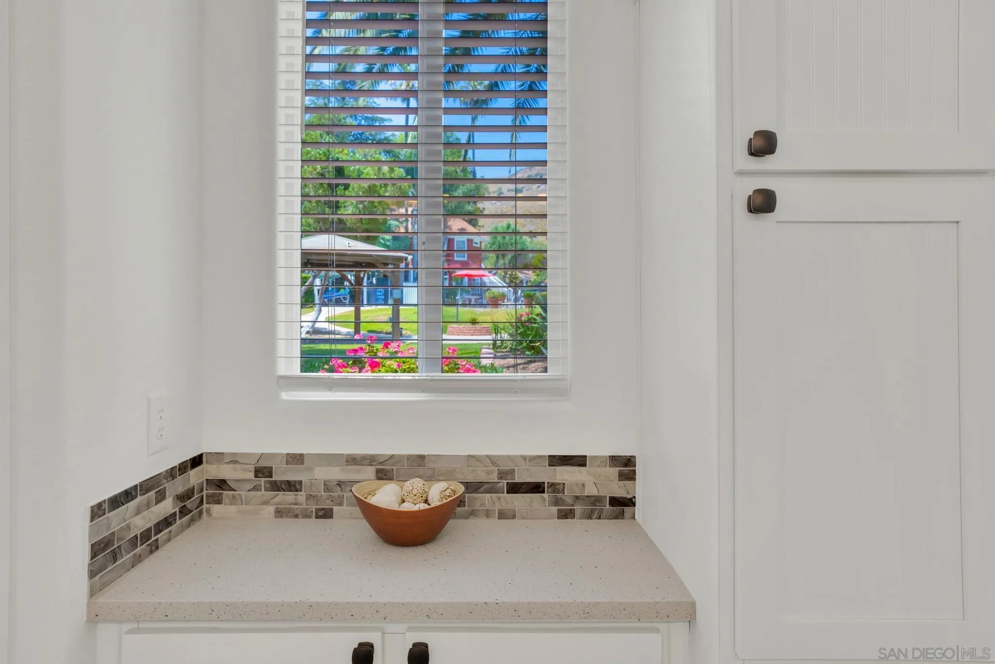 1120 Pepper Drive, Unit 183 El Cajon, CA 92021 - Photo 14 of 21 a bathroom with a sink and a window