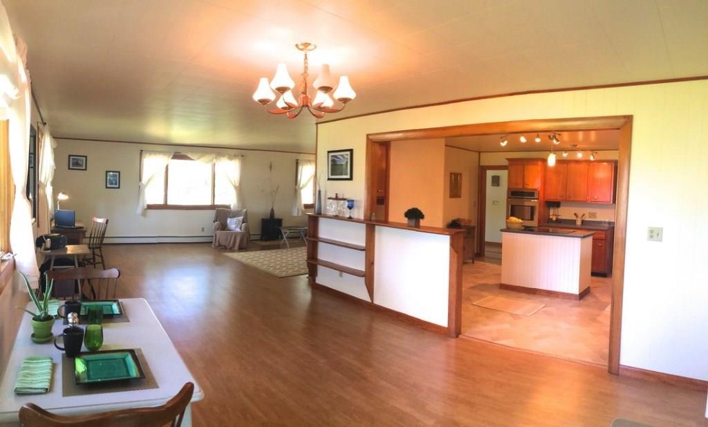 202 Little Deer Isle Road Little Deer Isle, ME 04650 - Photo 22 of 35 Dining area to kitchen and living room