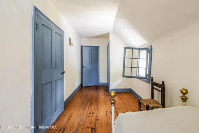 a view of a livingroom with toys and a window