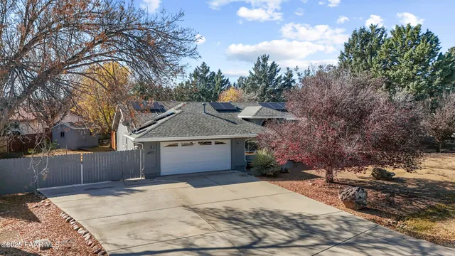 a view of a covered with snow in the yard