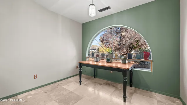 a spacious bathroom with a double vanity sink a mirror and a shower