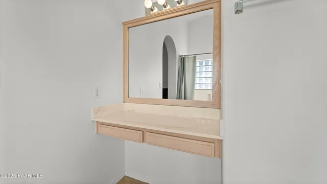 a swimming pool with wooden fence