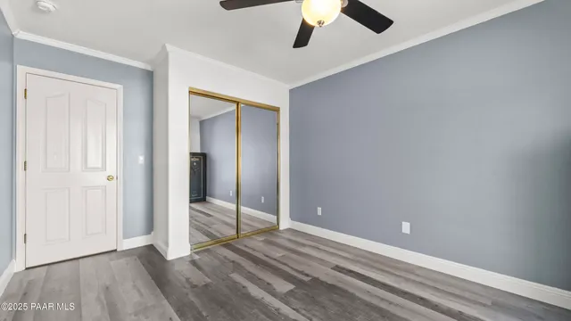 a view of a road with a building in the background