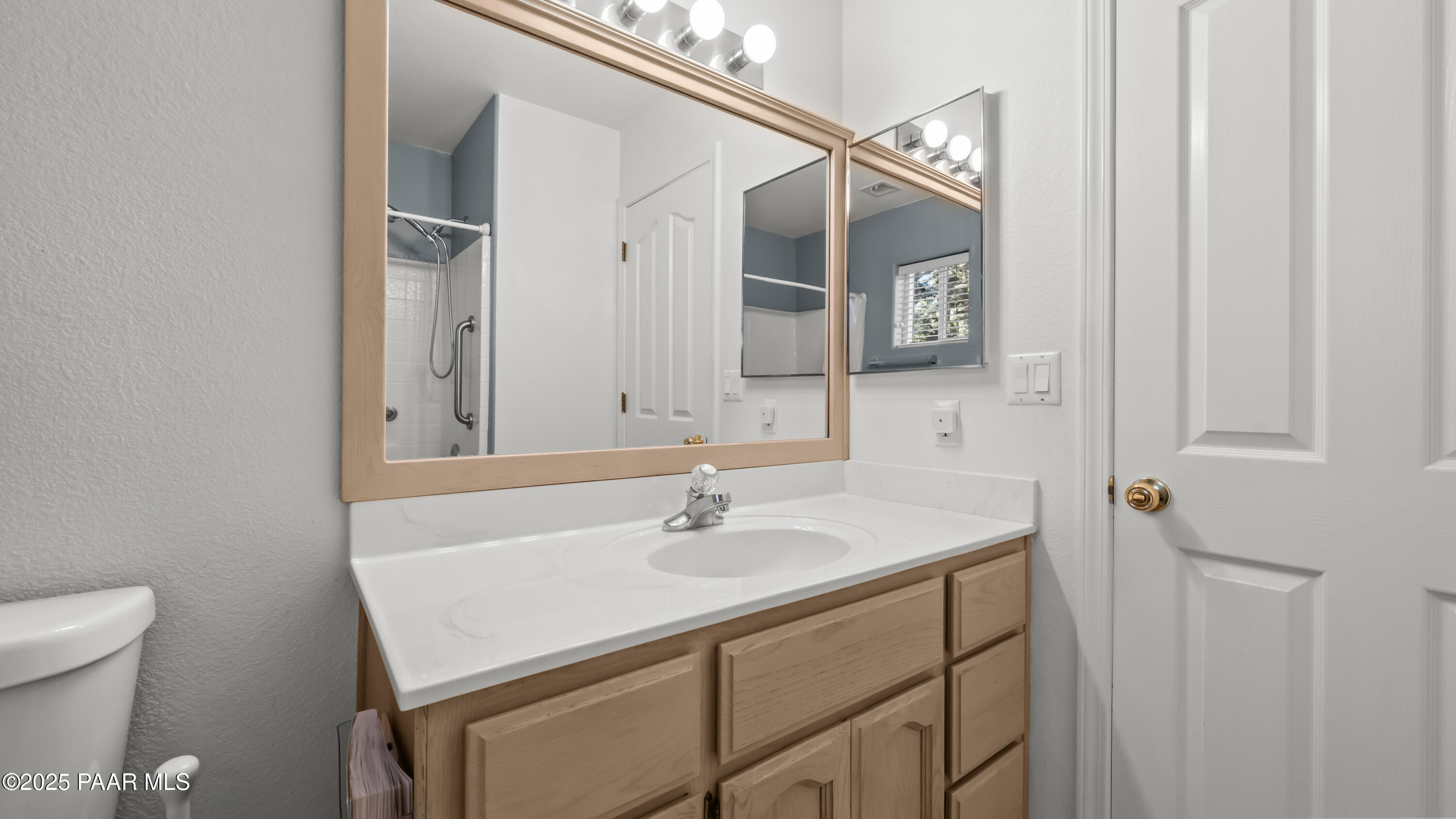 11873 East Turquoise Circle Dewey, AZ 86327 - Photo 42 of 86 a bathroom with a sink and a mirror