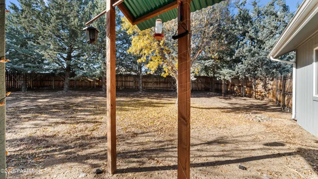 an aerial view of residential house and sandy dunes