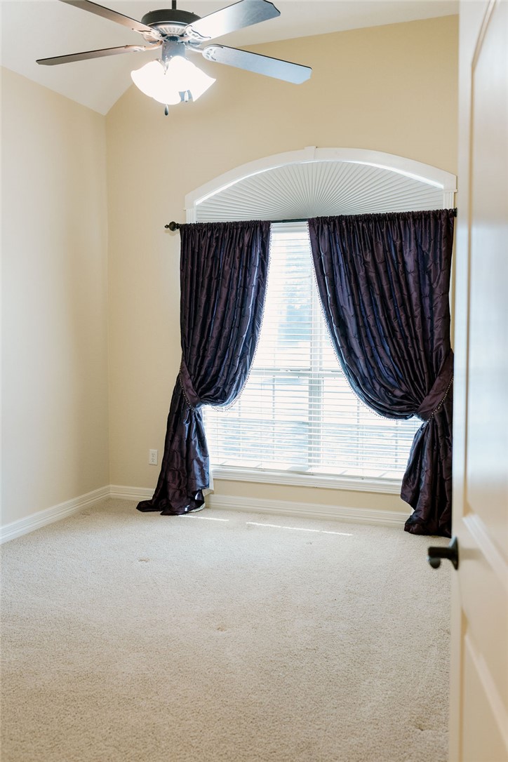 1909 Debbie Drive Bryan, TX 77802 - Photo 21 of 34 an empty room with windows