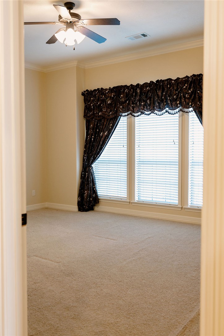 1909 Debbie Drive Bryan, TX 77802 - Photo 24 of 34 a view of an empty room with a window