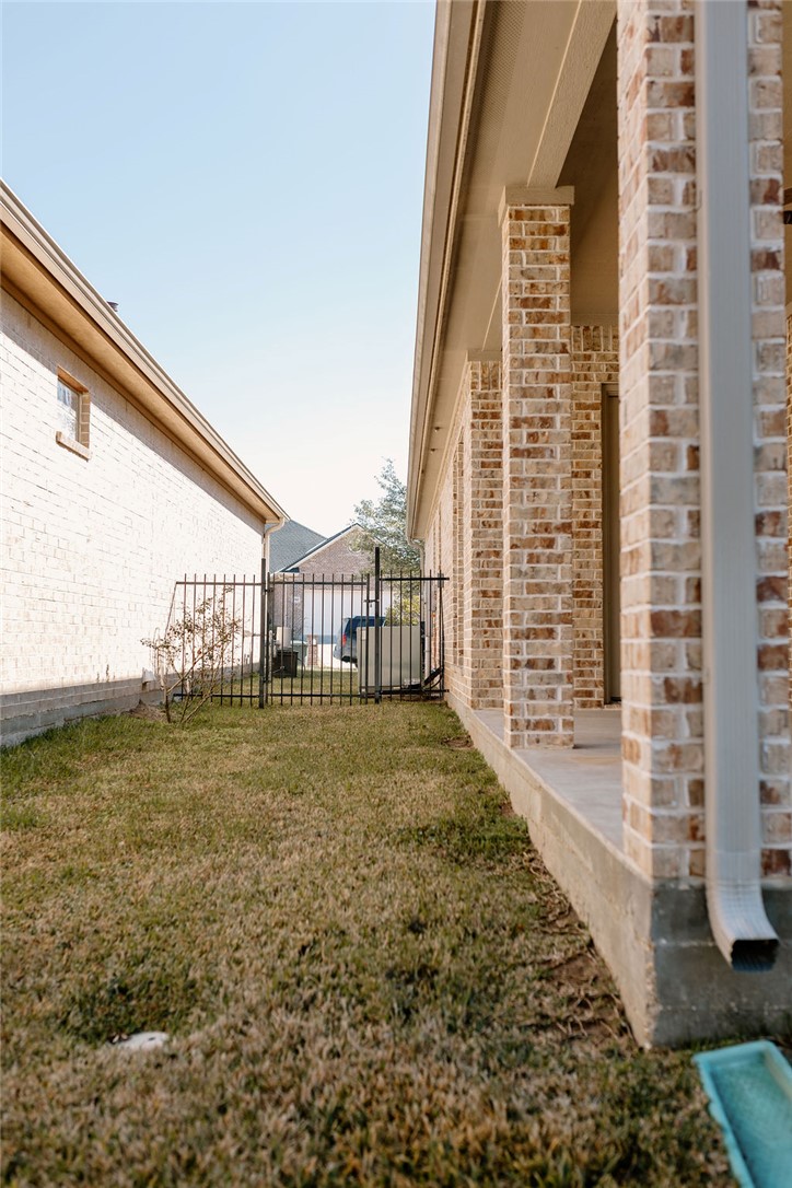 1909 Debbie Drive Bryan, TX 77802 - Photo 30 of 34 a view of a porch with a big yard