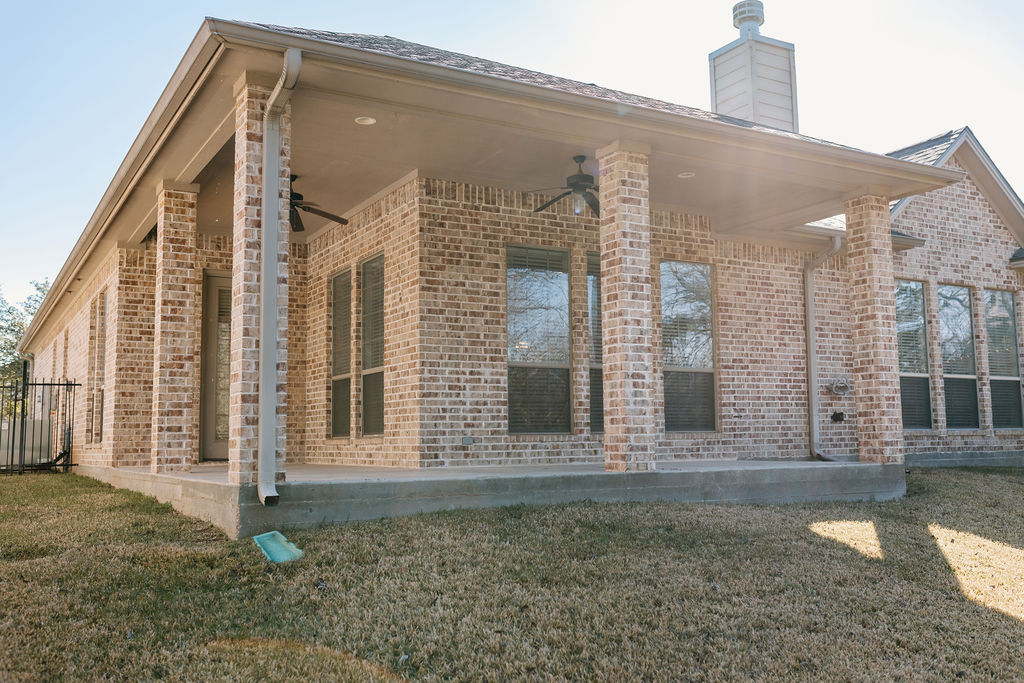 1909 Debbie Drive Bryan, TX 77802 - Photo 33 of 34 a front view of a house with large windows