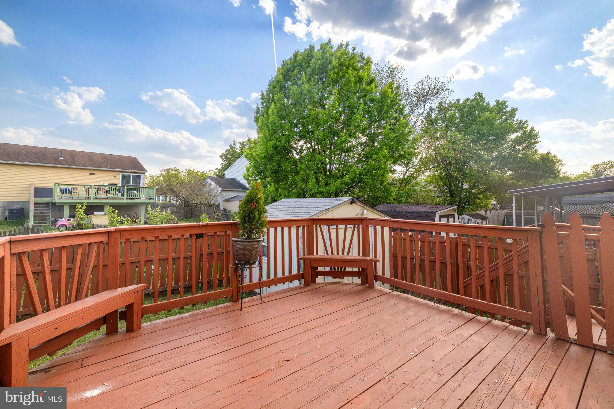 17 Morning Court Rosedale, MD 21237 - Photo 19 of 21 Sunny deck with lush greenery backdrop.