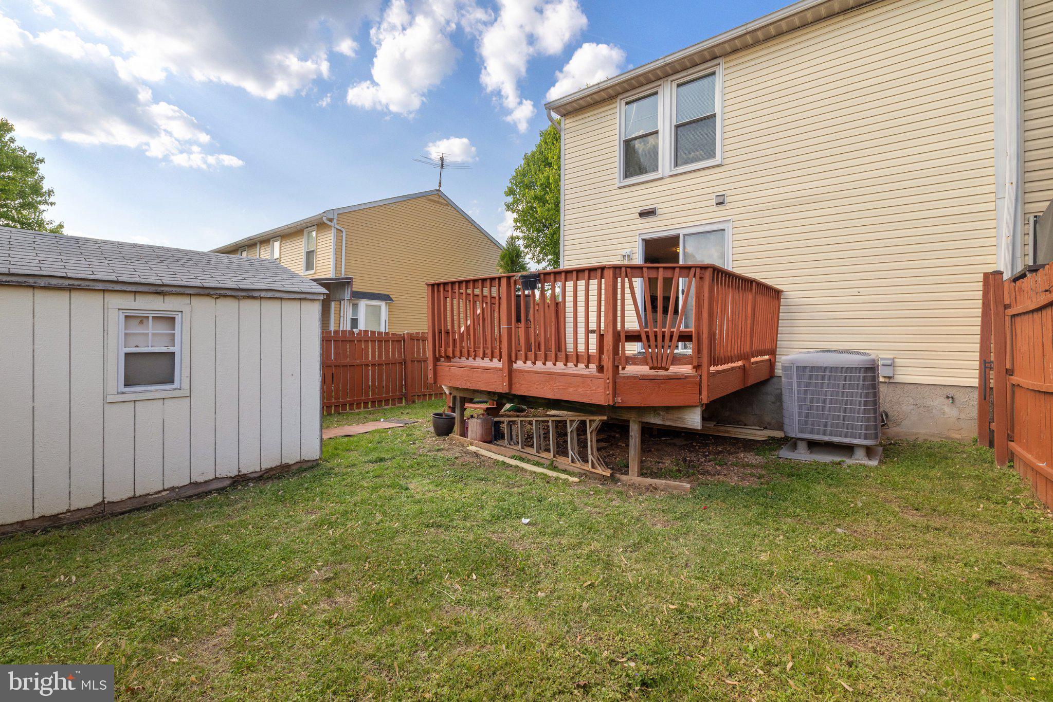 17 Morning Court Rosedale, MD 21237 - Photo 20 of 21 Charming backyard with a cozy deck.