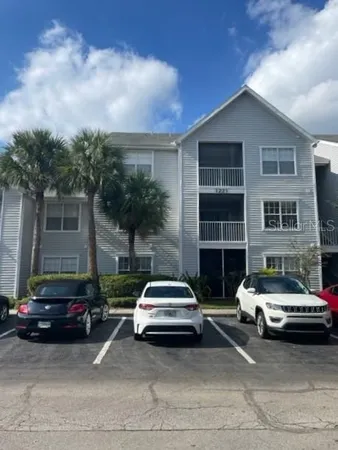 a car parked in front of a house