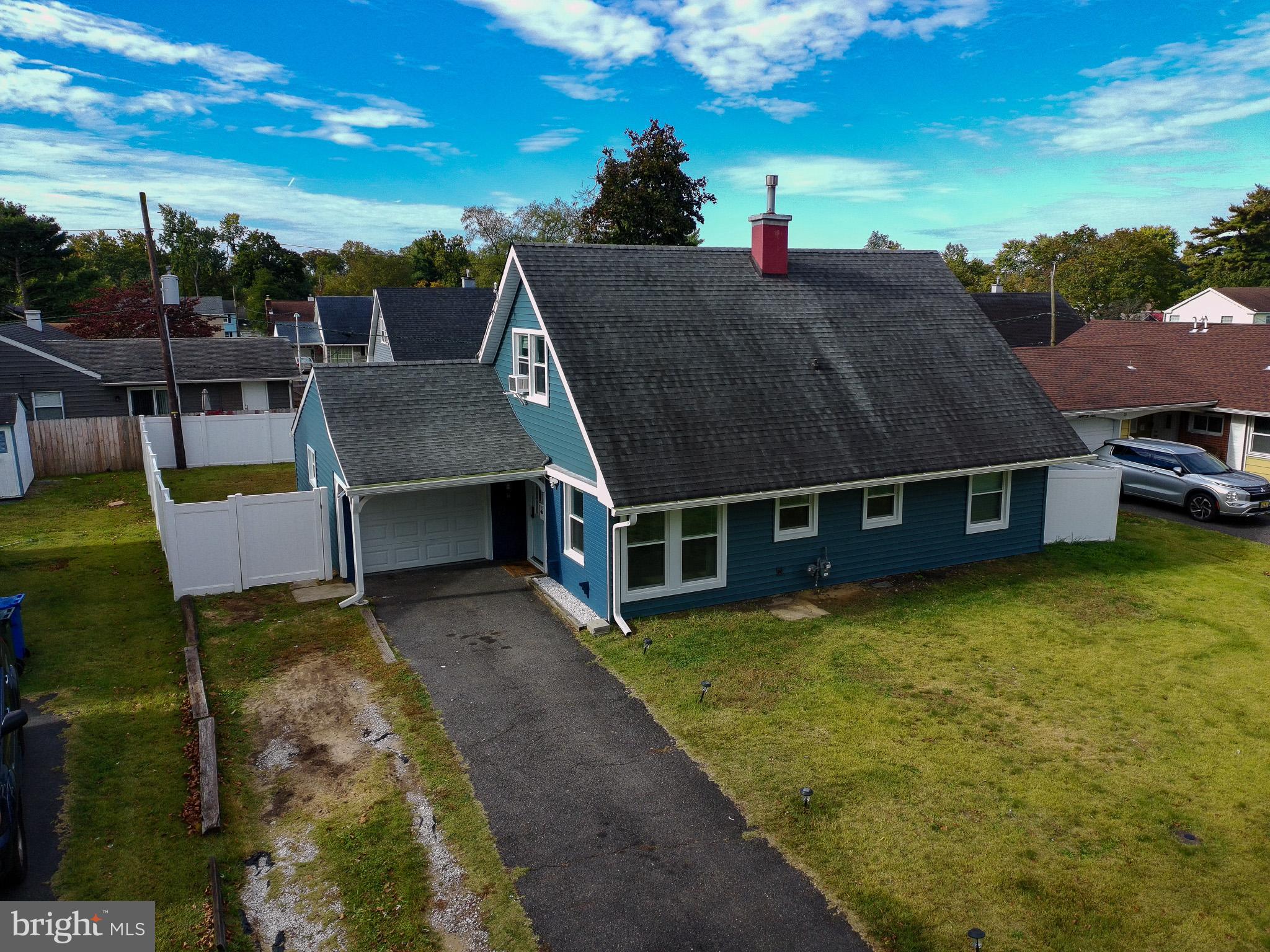 30 Babcock Lane Willingboro, NJ 08046 - Photo 28 of 35 a view of a house with pool and a garden