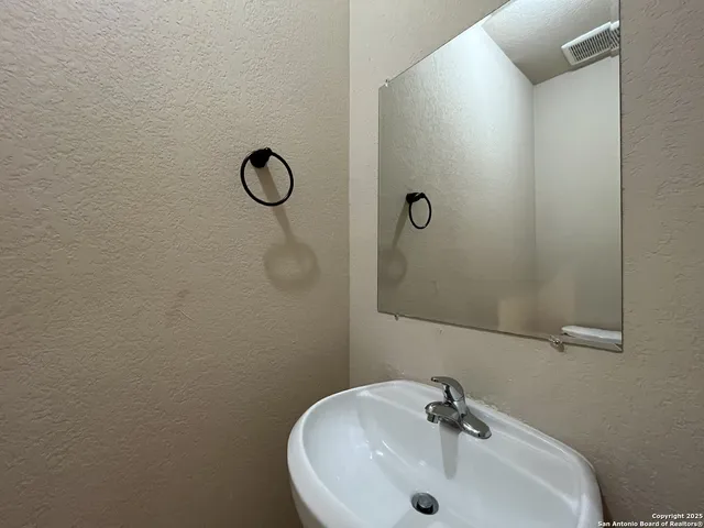 a house view with a backyard space