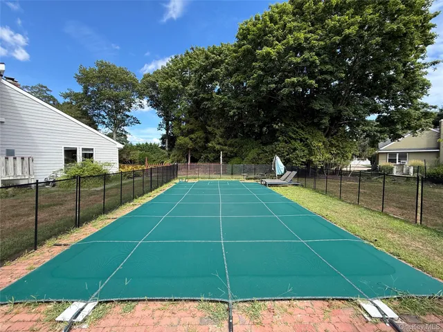 a tennis court view covered with outdoor space