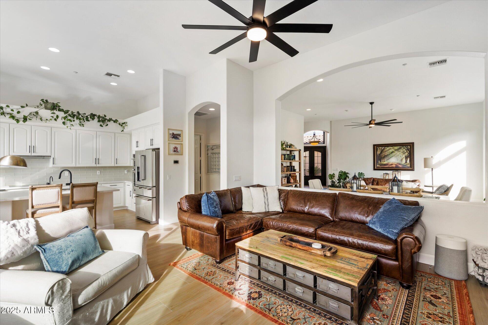 10747 East Greenway Road Scottsdale, AZ 85255 - Photo 17 of 56 a living room with furniture and a view of kitchen