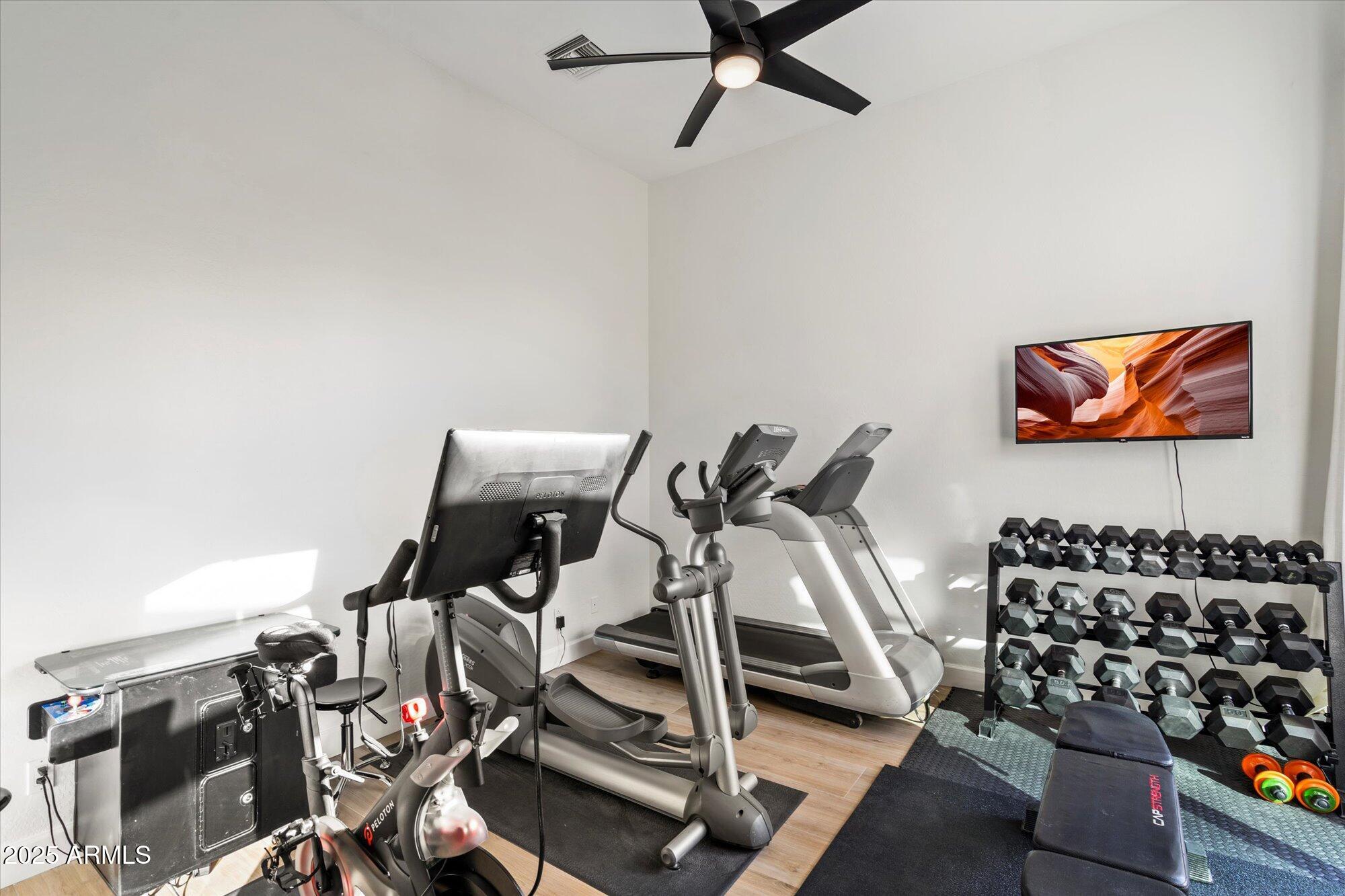 10747 East Greenway Road Scottsdale, AZ 85255 - Photo 25 of 56 a view of a room with gym equipment
