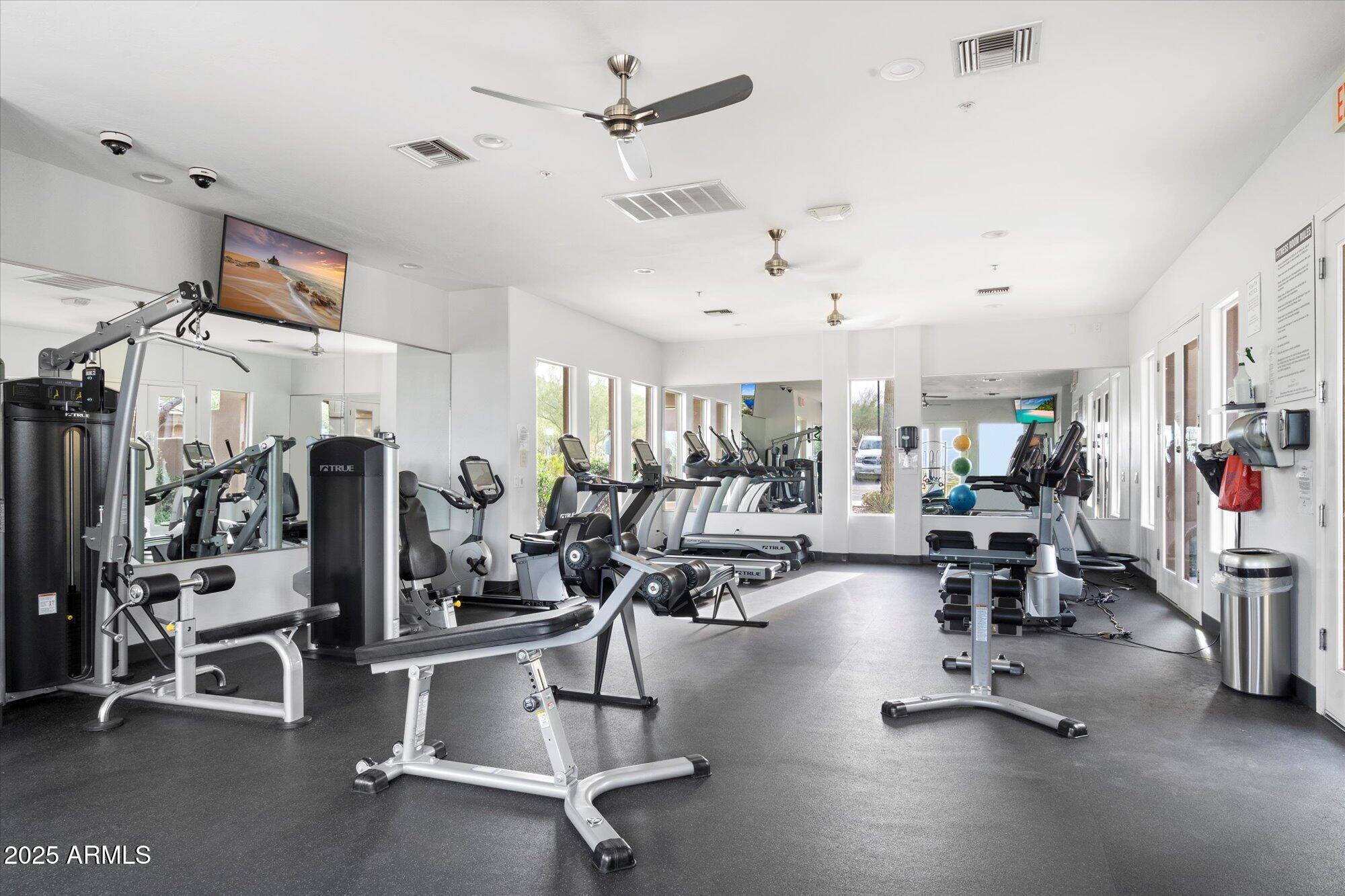 10747 East Greenway Road Scottsdale, AZ 85255 - Photo 40 of 56 a view of a room with gym equipment