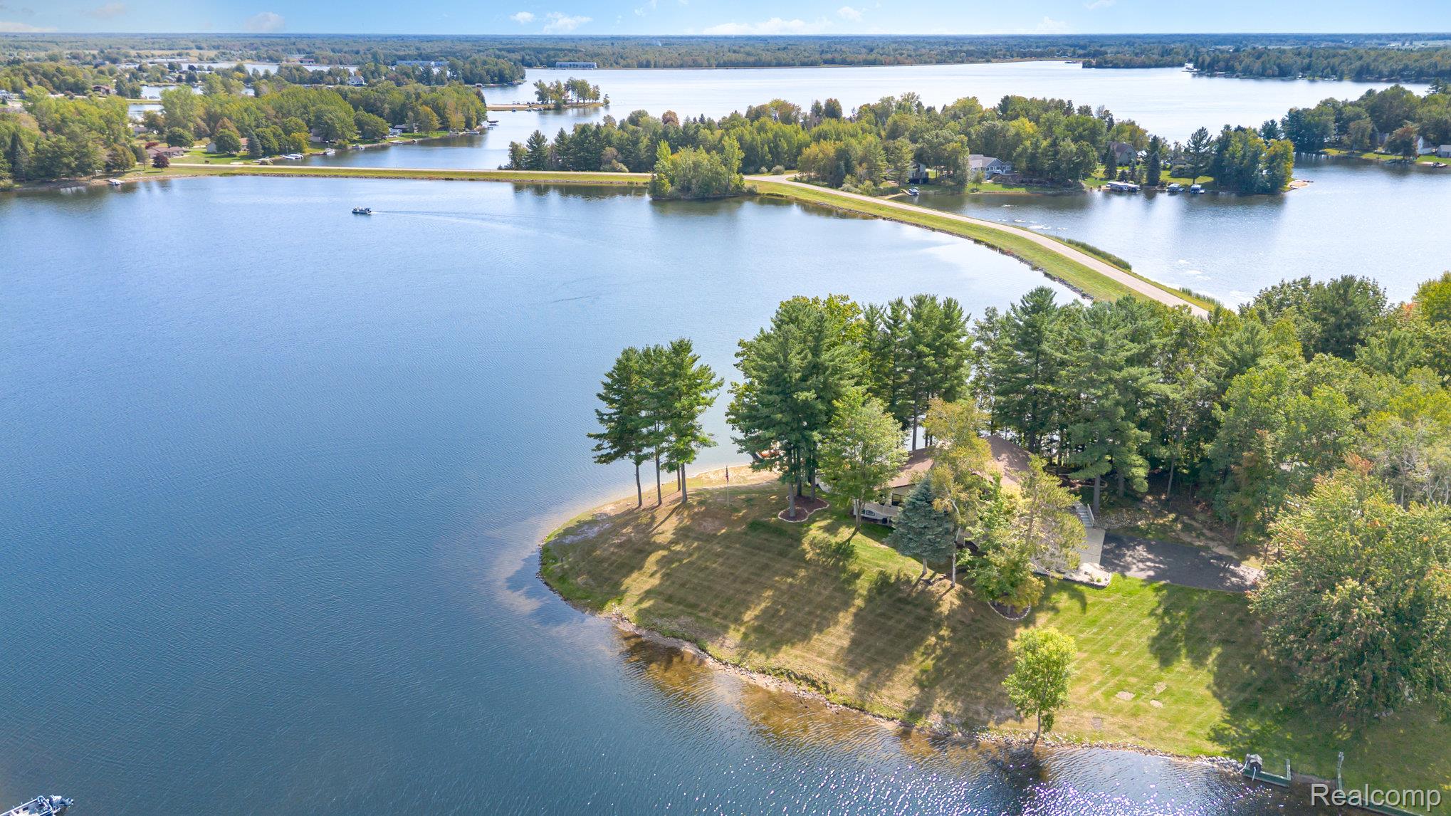 2380 Islanders Way Gladwin, MI 48624 - Photo 44 of 48 Aerial view of a nearby body of water