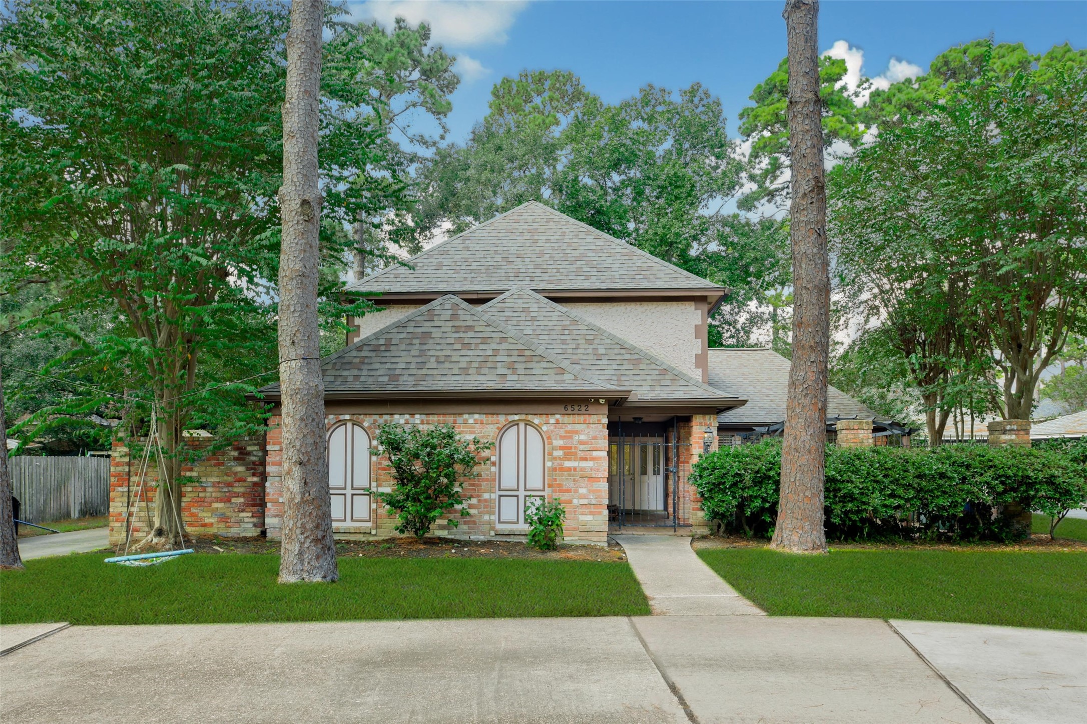 6522 Castle Pine Lane Spring, TX 77379 - Photo 1 of 38 front view of a house with a yard