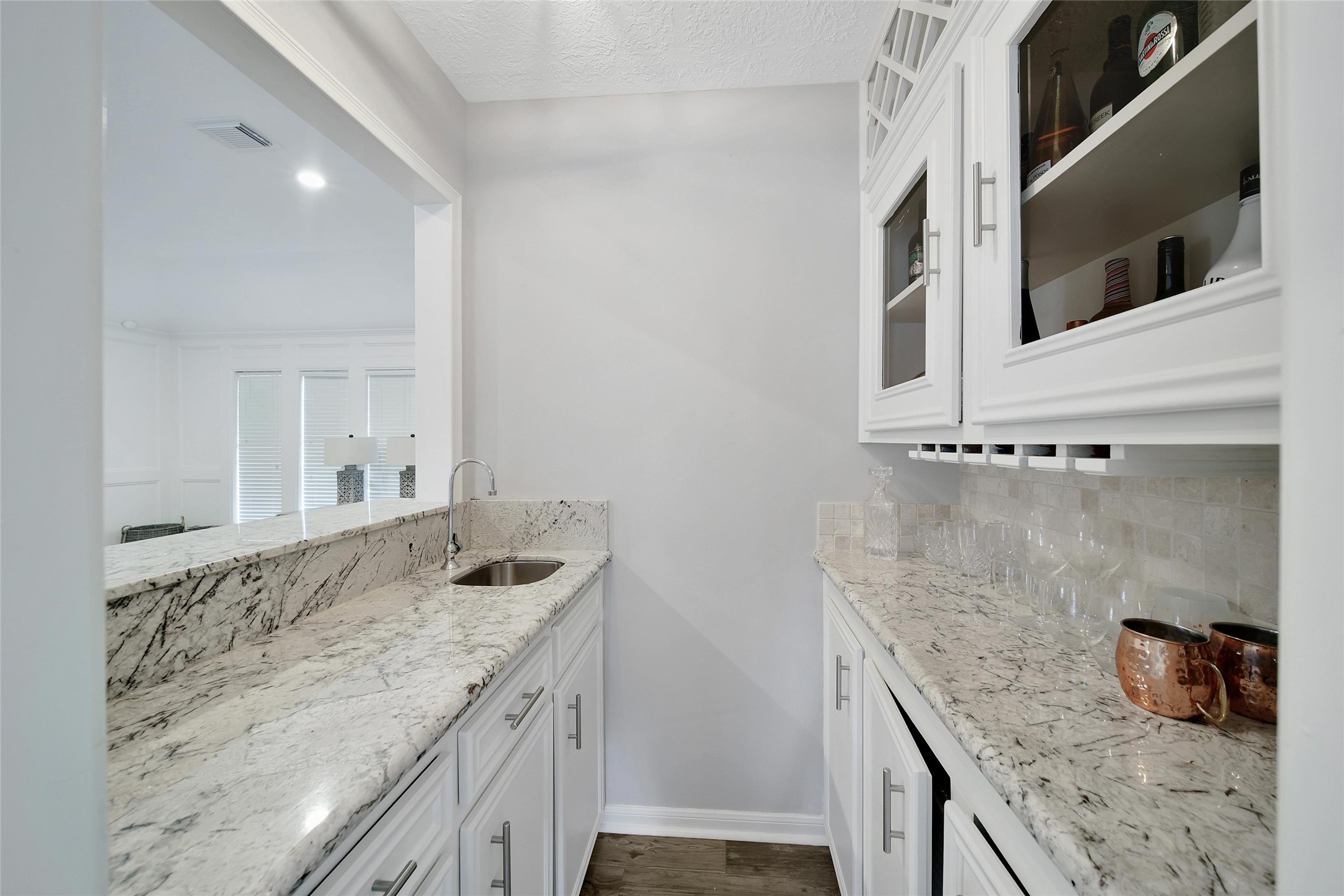 6522 Castle Pine Lane Spring, TX 77379 - Photo 12 of 38 a bathroom with a granite countertop sink and a mirror